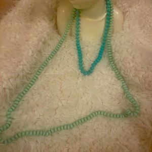 2 turquoise necklaces beads hard plastic. Small 11 inches and 23 inches.